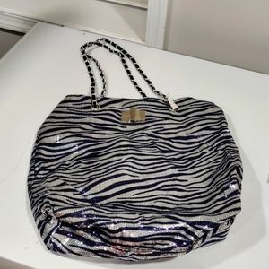 New- blue/silver sequin bag with black/silver straps.